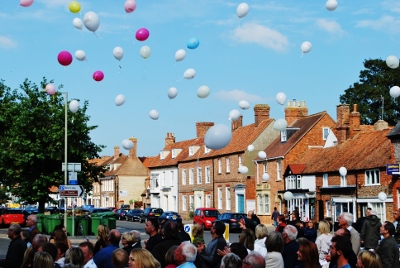 Hundreds of balloons are launched in the sky at the opening of the Thame Youth Memorial