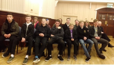 The group of skate park users sit in the council chamber, awaiting good news from the town council about their new skatepark