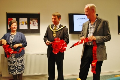 The moment the red ribbon is cut by the Mayor, Peter Lambert