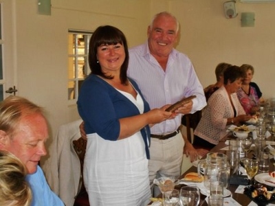 Jacky Willougby receives her award from Thame Lions'President, Roger Blackburn