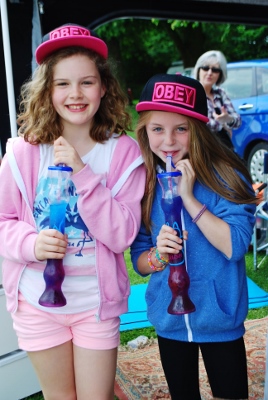 One of Sue Martin Downhill's girls (left) enjoying themselves - without her mum - at Saturday's carnival