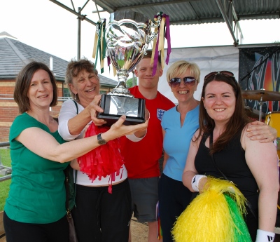 The 'School together' carnival collected their winners cup from the Deputy Mayor, Nicola Dixon