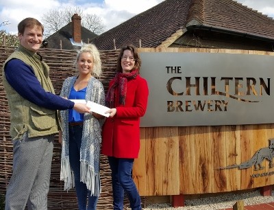 Cheque presentation at Chiltern Brewery (L to R: Tom Jenkinson, Vicky Blane, Claire Forrest)